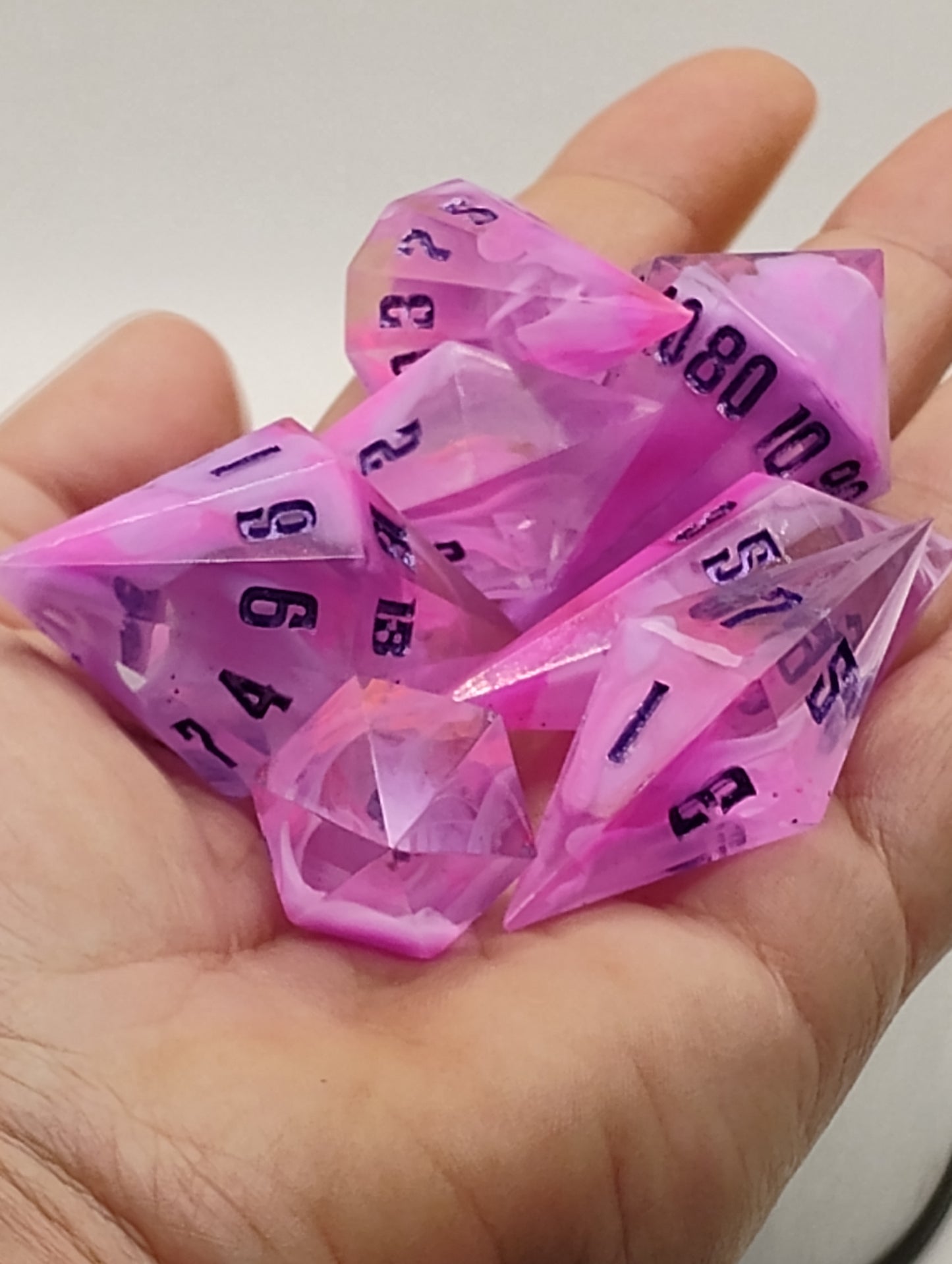 Rosequartz Veil – Pink and Clear Swirled Crystal Dice Set for TTRPG Adventures