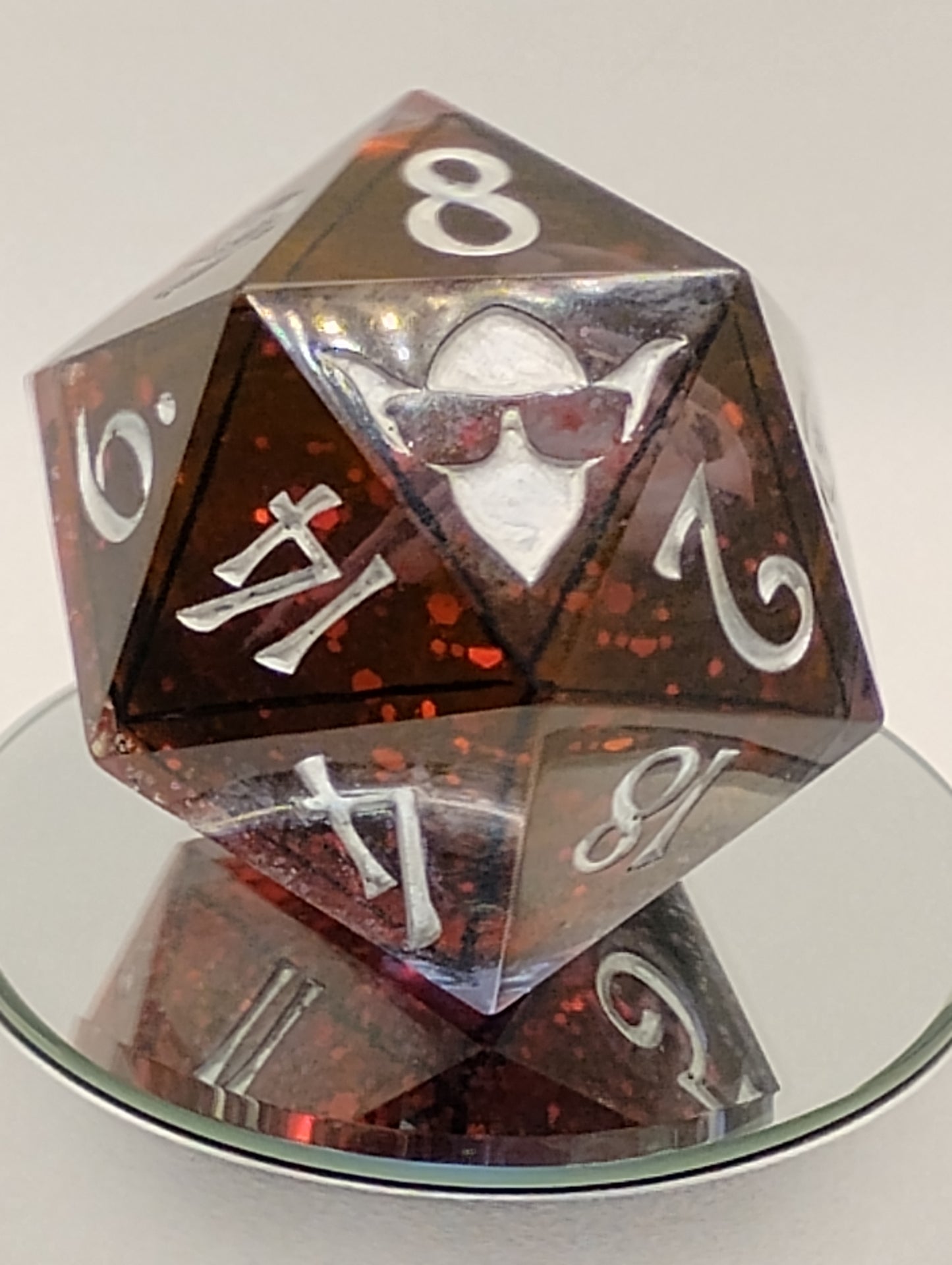 Ravenheart Monolith – 78mm Handmade Chonk D20 with Red Glitter and Ghostly Raven Skull Core