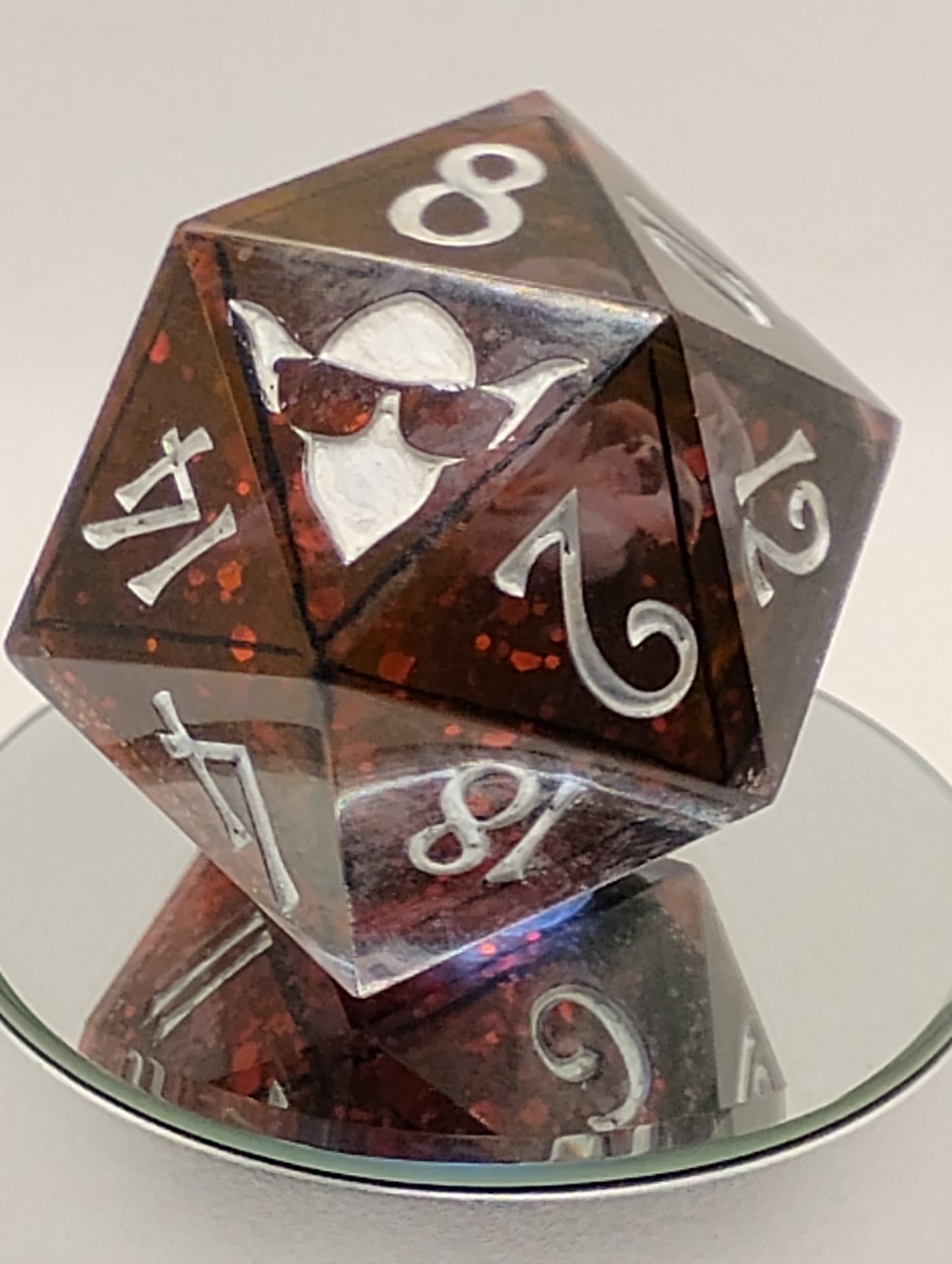 Ravenheart Monolith – 78mm Handmade Chonk D20 with Red Glitter and Ghostly Raven Skull Core