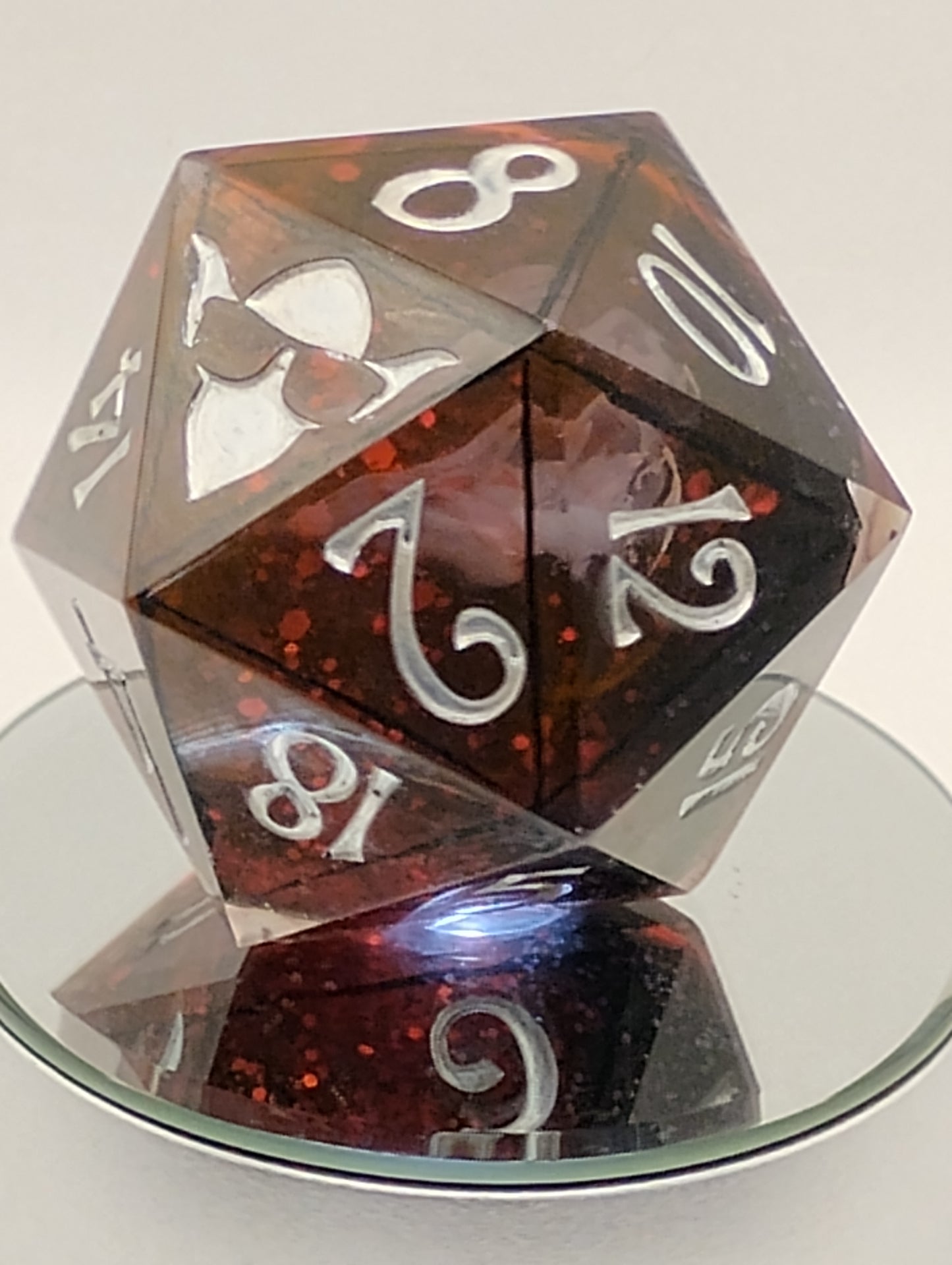 Ravenheart Monolith – 78mm Handmade Chonk D20 with Red Glitter and Ghostly Raven Skull Core