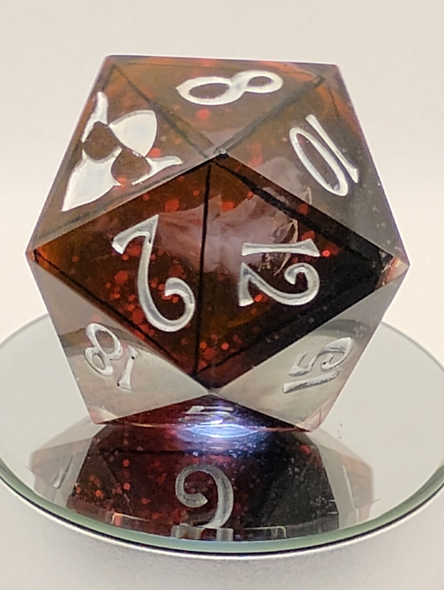 Ravenheart Monolith – 78mm Handmade Chonk D20 with Red Glitter and Ghostly Raven Skull Core