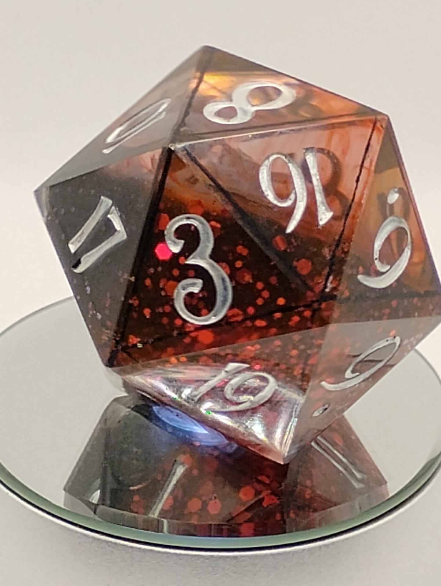 Ravenheart Monolith – 78mm Handmade Chonk D20 with Red Glitter and Ghostly Raven Skull Core