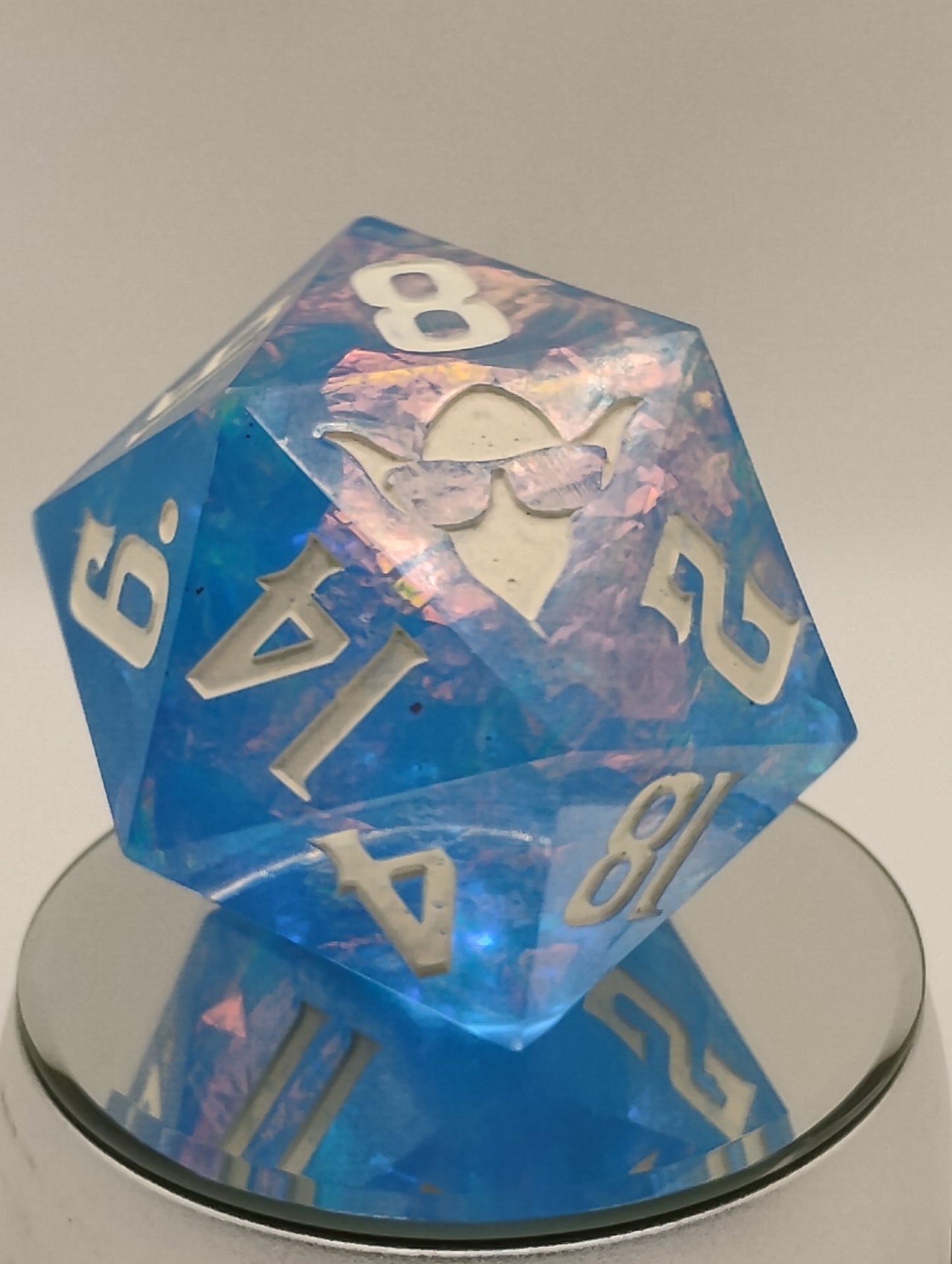 85mm Celestial Regret Chonk D20 – Handmade Giant DnD Die in Light Blue with Opalescent Holographic Foil & White Ink