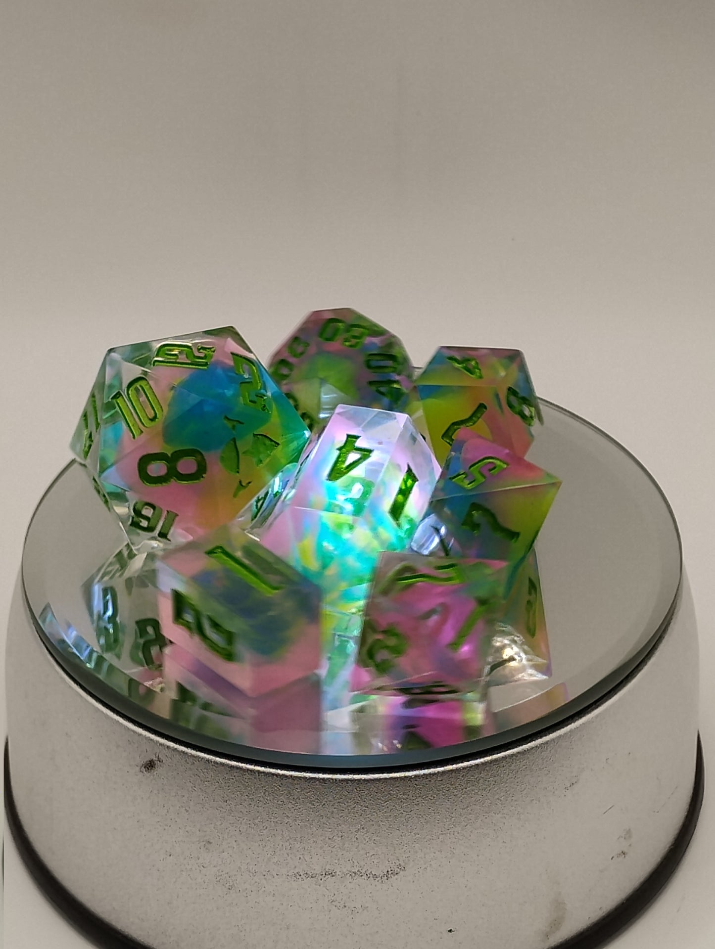 BLACKLIGHT REACTIVE Colorful Catastrophe Dice Set – Translucent RPG Dice with Green Numbers for Dungeons & Dragons and TTRPGs