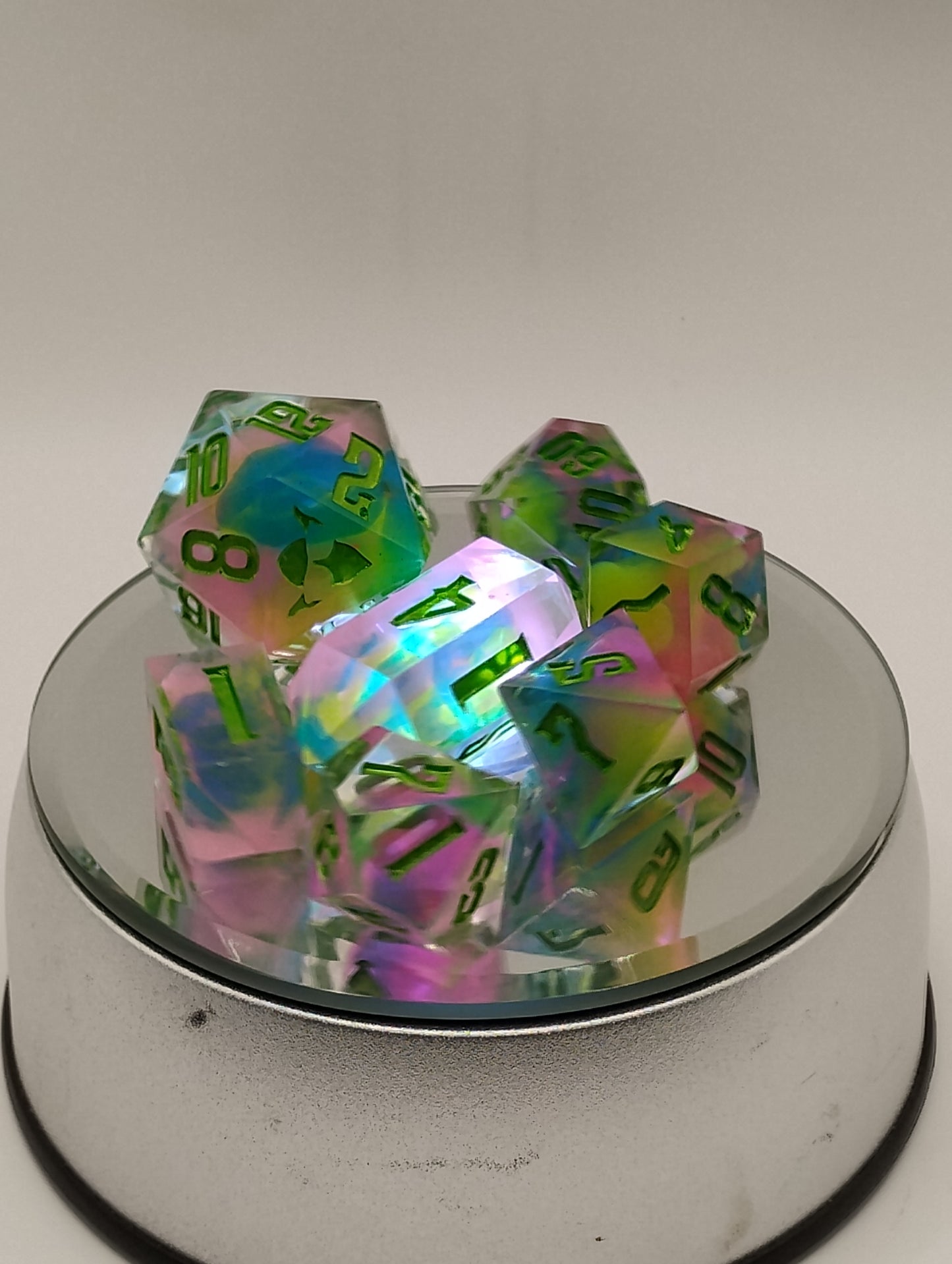 BLACKLIGHT REACTIVE Colorful Catastrophe Dice Set – Translucent RPG Dice with Green Numbers for Dungeons & Dragons and TTRPGs