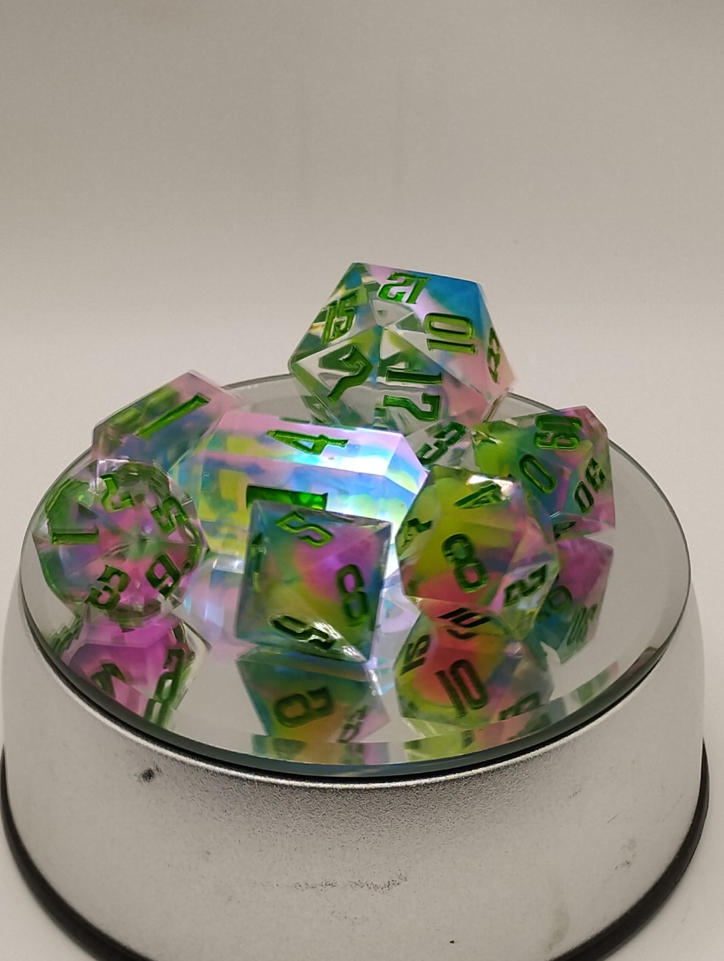 BLACKLIGHT REACTIVE Colorful Catastrophe Dice Set – Translucent RPG Dice with Green Numbers for Dungeons & Dragons and TTRPGs